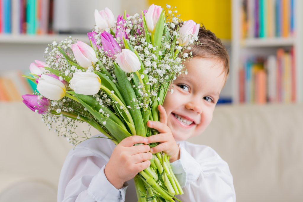 New Ways of Sharing the Love with Little Ones this Valentine’s Day - Boy holding flowers